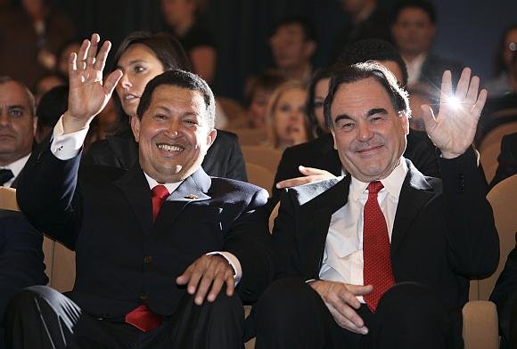 Hugo Chavezas ir Oliveris Stone'as Venecijos kino festivalyje