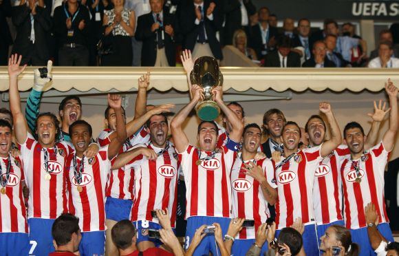Triumfuojantys Madrido „Atletico“ futbolininkai