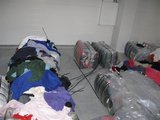 Policijos nuotr./Policijos konfiskuoti drabužiai