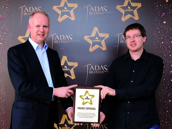 UAB „Švyturys-Utenos alus“ generalinis direktorius Rolandas Viršilas ir filmo „Tadas Blinda. Pradžia“ prodiuseris Žilvinas Naujokas