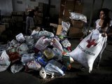 &bdquo;Reuters&ldquo;/&bdquo;Scanpix&ldquo; nuotr./Humanitarinė pagalba nuo žemės drebėjimo nukentėjusiems žmonėms