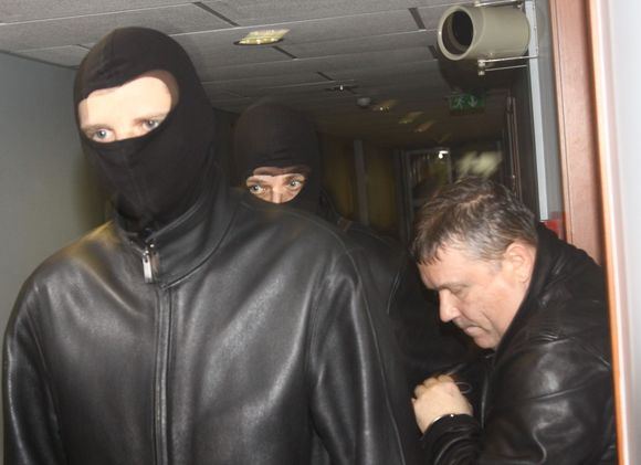 Asociatyvinė iliustracija: V.Karalius vedamas į teismą