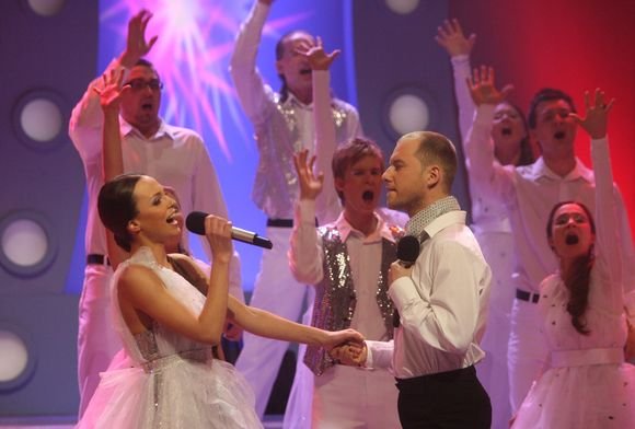 Muzikinės miestų ir chorų  kovos „Chorų karuose“ akimirka