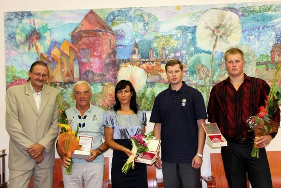 Kauno miesto simboliais ir padėkomis apdovanoti ne tik disko metikas Andrius Gudžius ir iškluotoja Donata Vištartaitė, bet ir jų treneriai.