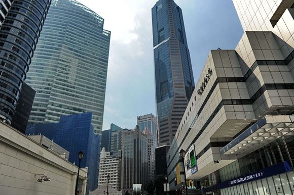 AFP/„Scanpix“ nuotr./Verslo rajonas Singapūre
